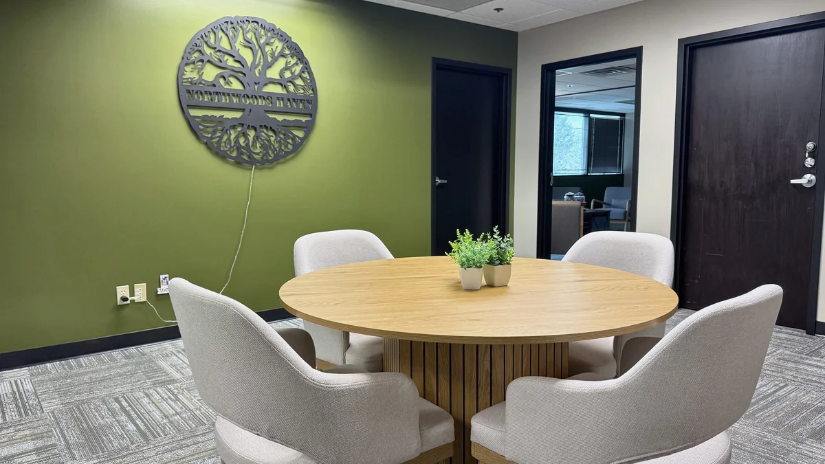 Group Room with a Round Table at Northwoods Haven Recovery